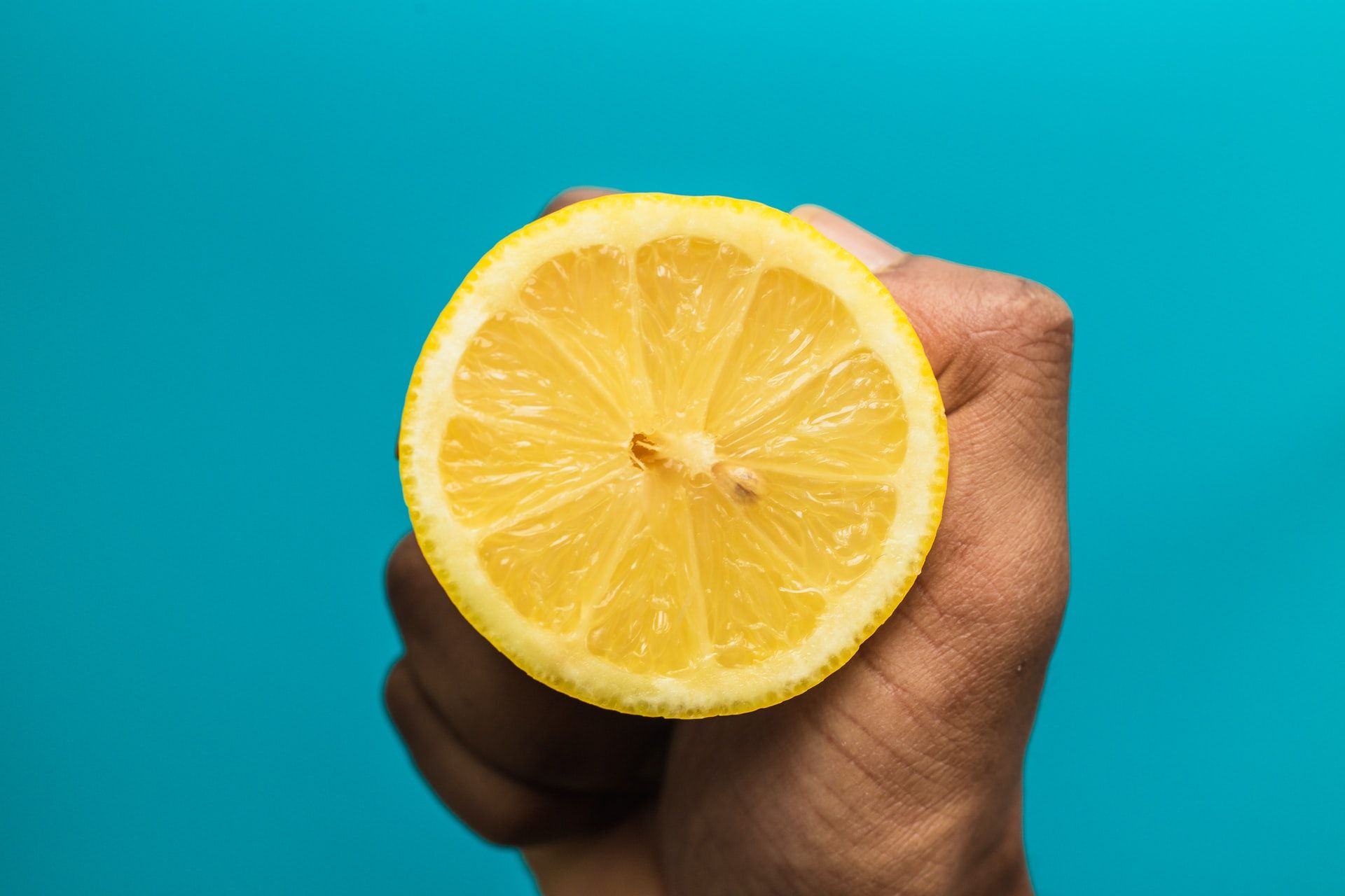 Holding a lemon