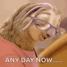 Animated gif of an animated sloth from Zootopia slowly turning her head. Text at the bottom reads "any day now..."