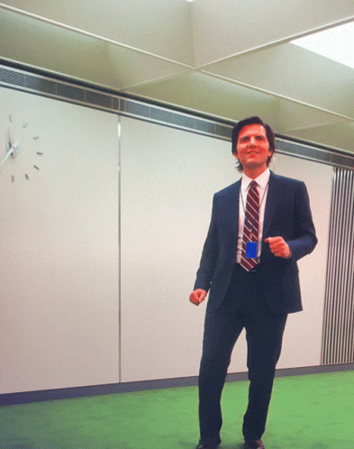 Animated GIF from the show Severance showing an office music and dance party.